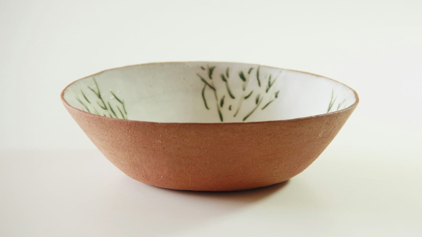 An empty terracotta bowl